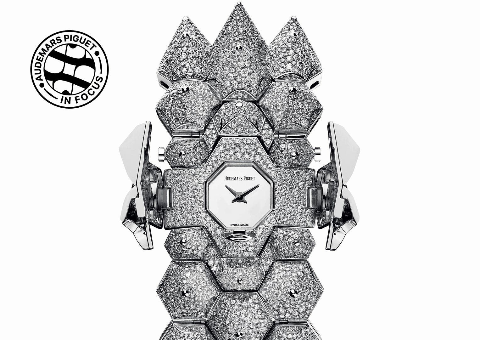 The sensational Diamond Outrage cuff watch is covered with more ice than Antarctica